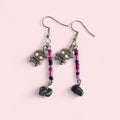 Pink and black skull earrings  image 0