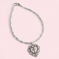 White cross  beaded bracelet image 0